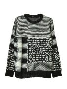 Sisley fekete, mintás, kötött lány pulóver – 120 cm